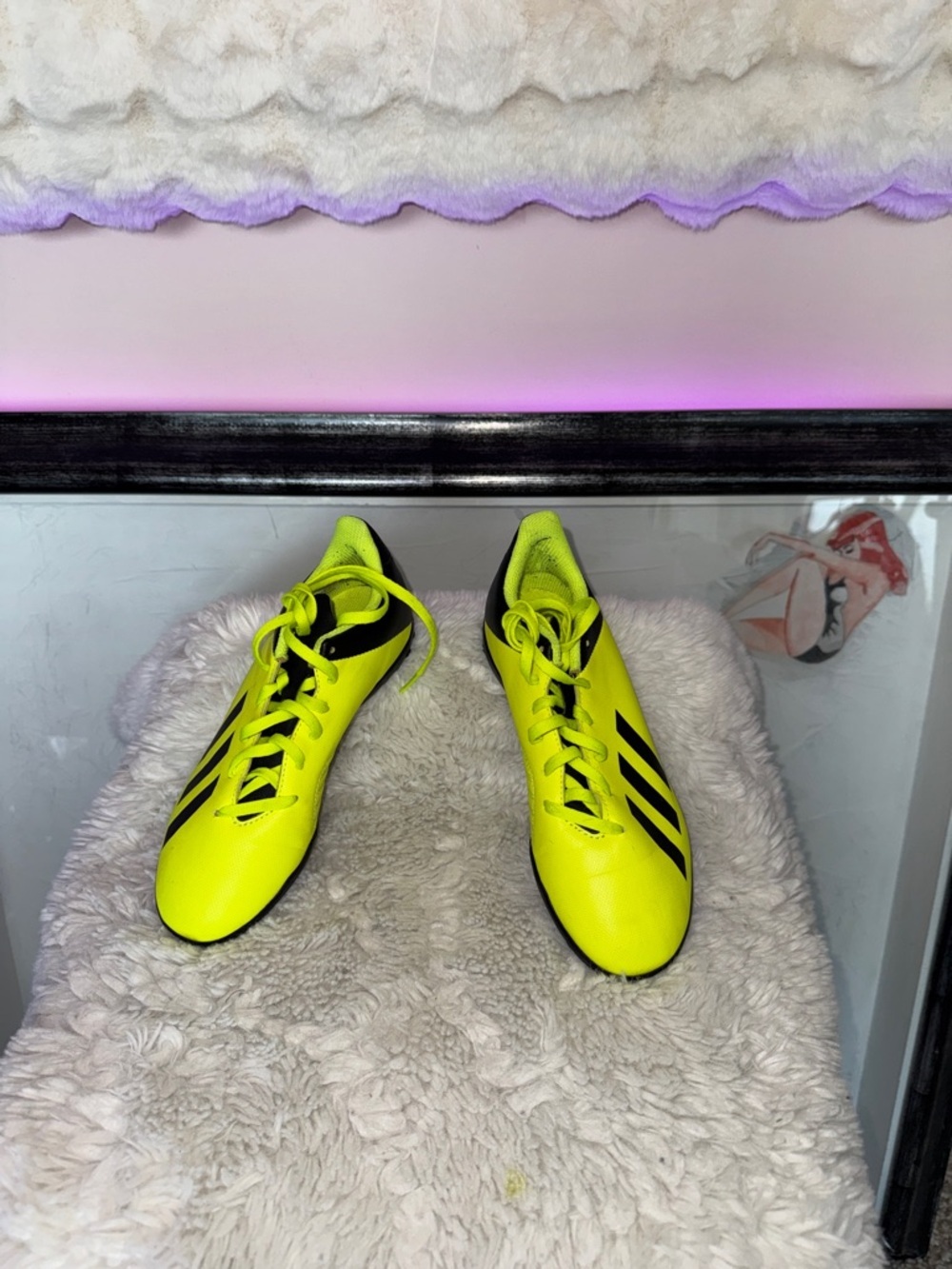 Neon green and black Adidas soccer sneakers for men or women